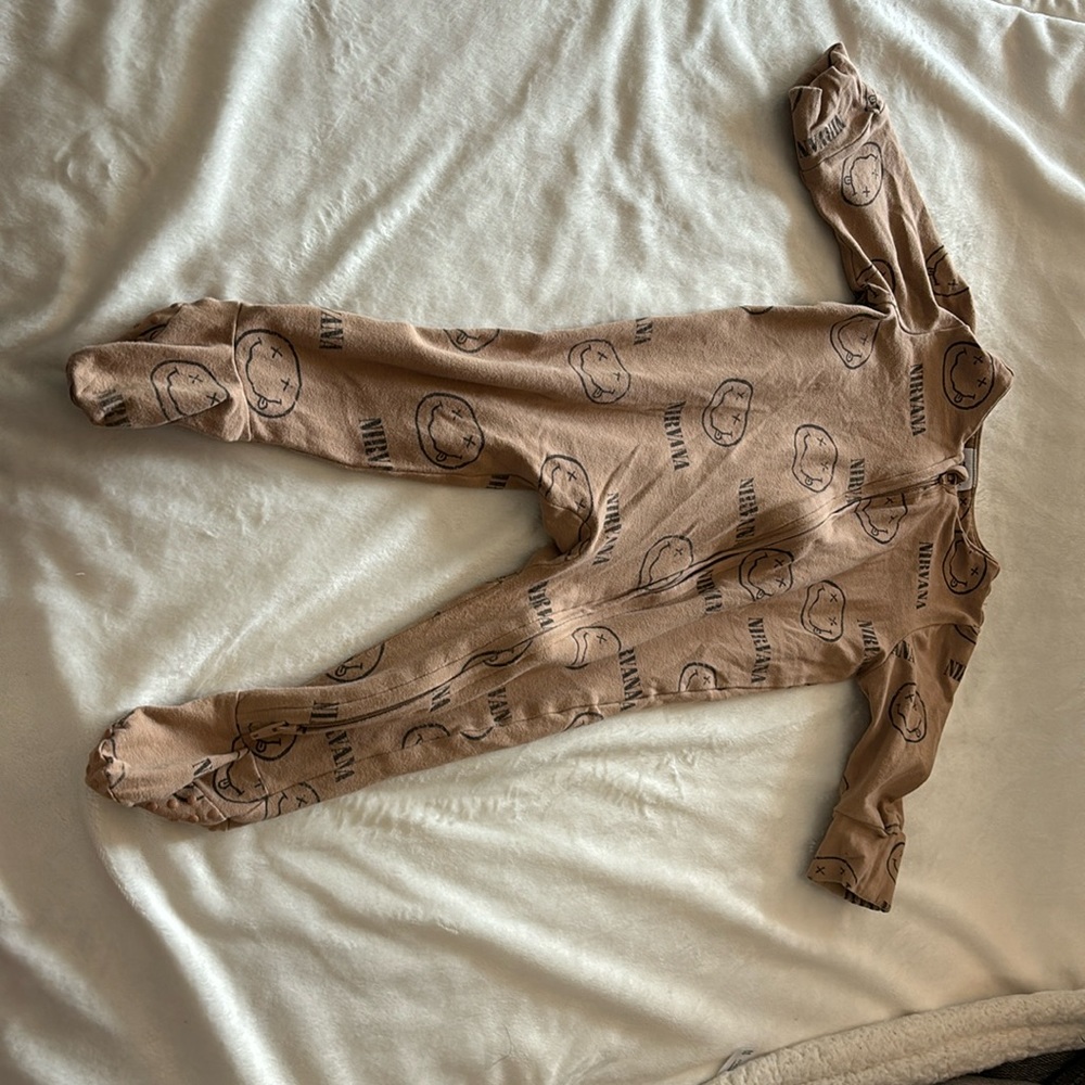 Lightly used Brown Nirvana pajama onsie from Cotton On Baby. Size 3-6 months.